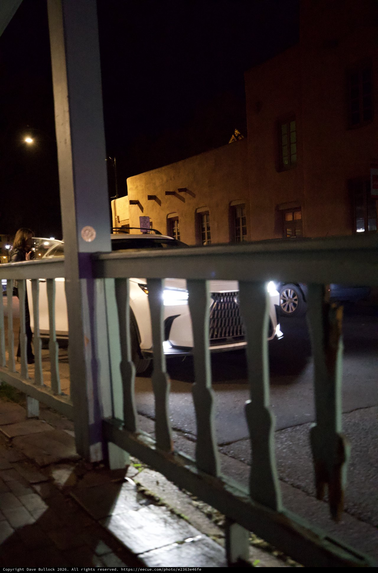 Night View Through Turquoise Railing in Santa Fe