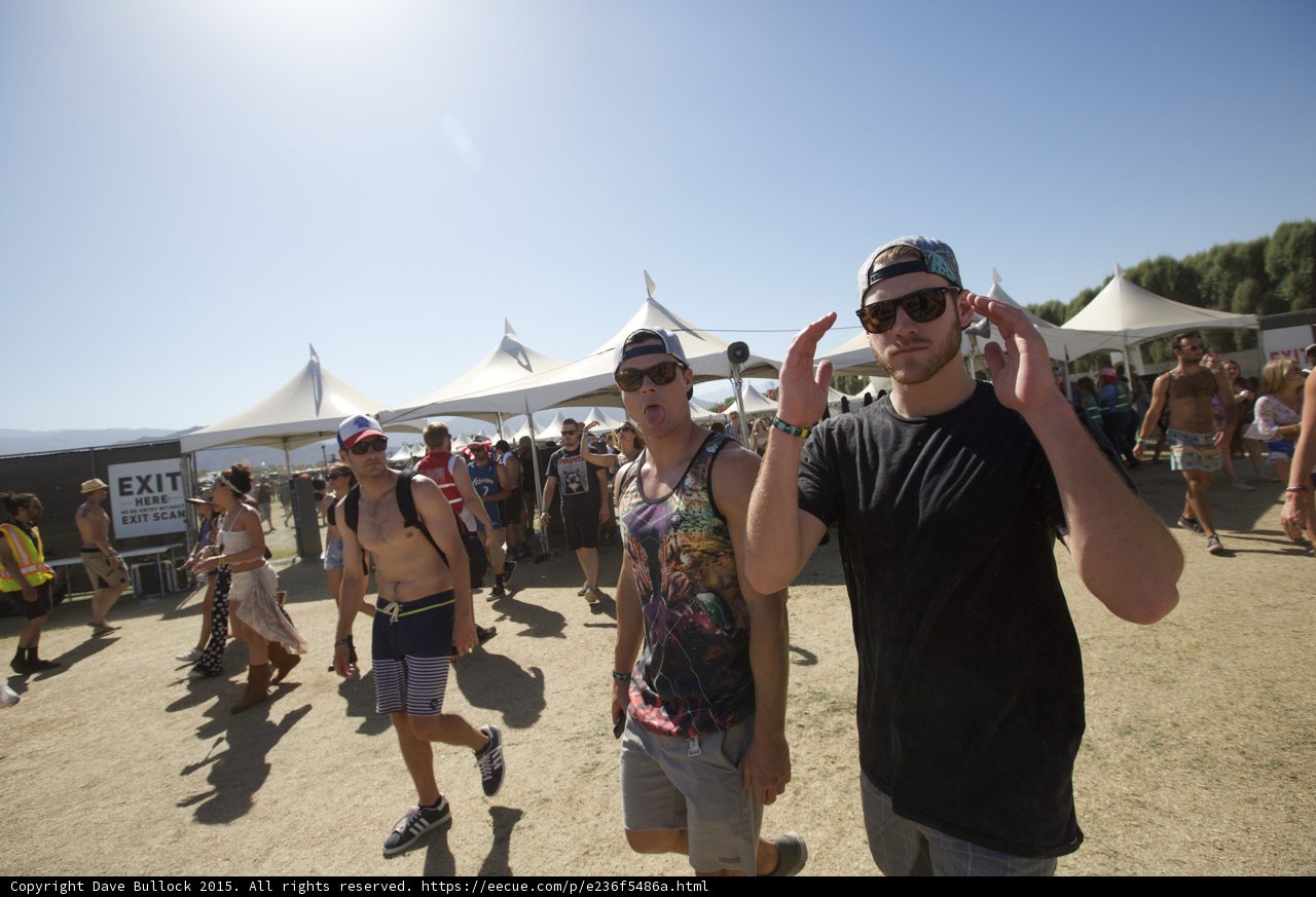 Two Men Enjoying the Music Festival