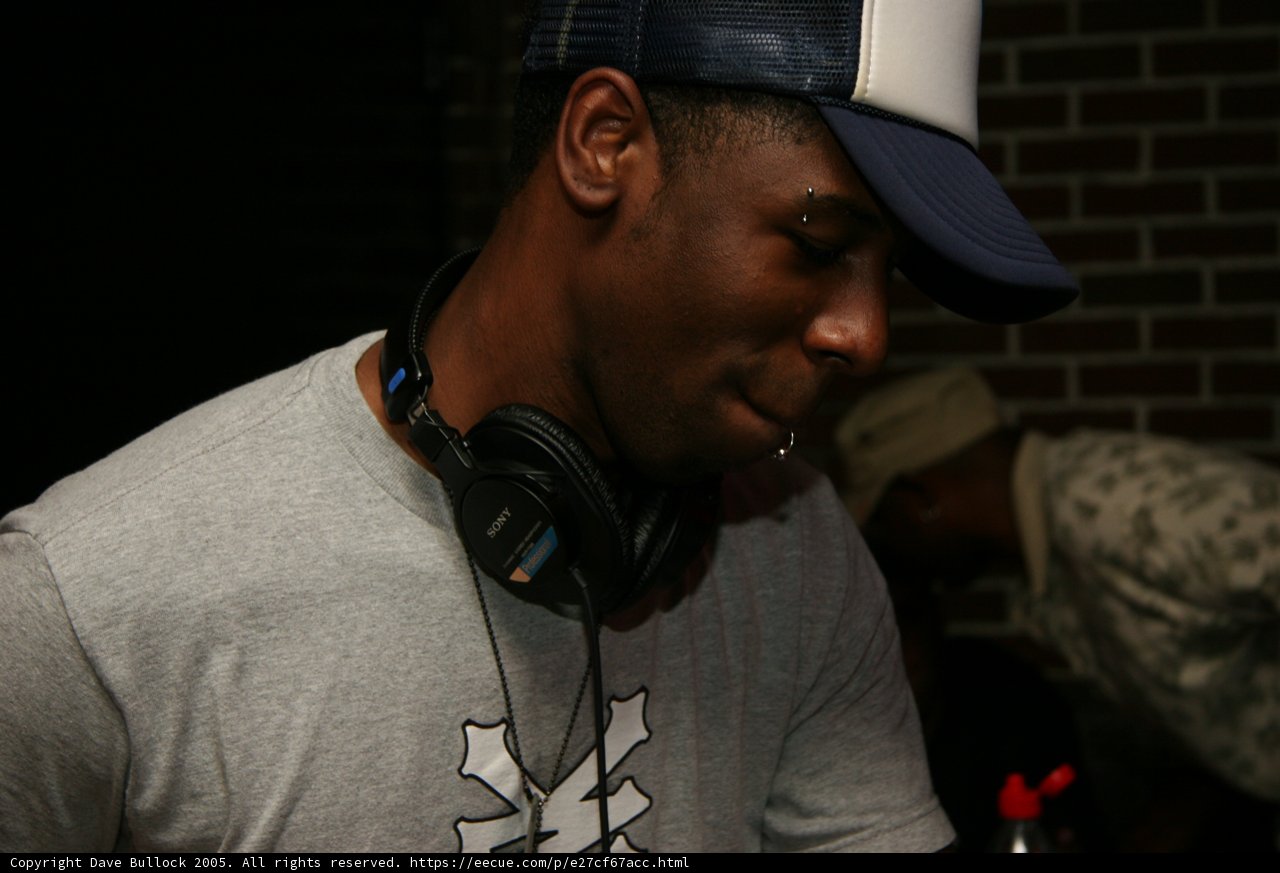 Man Chilling with His Favorite Cap and Headphones