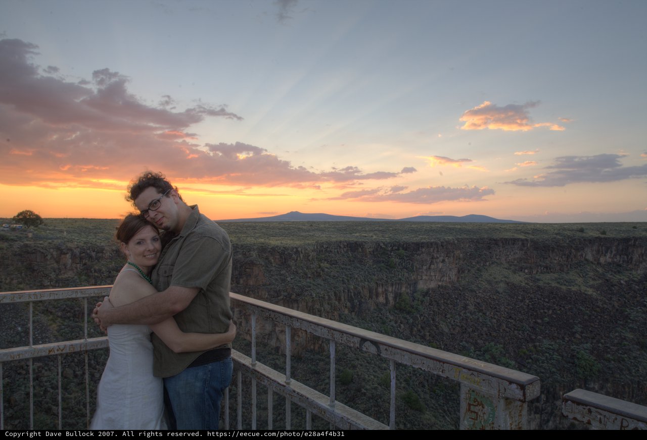 Couple Embracing at Sunset Over New Mexico Canyon