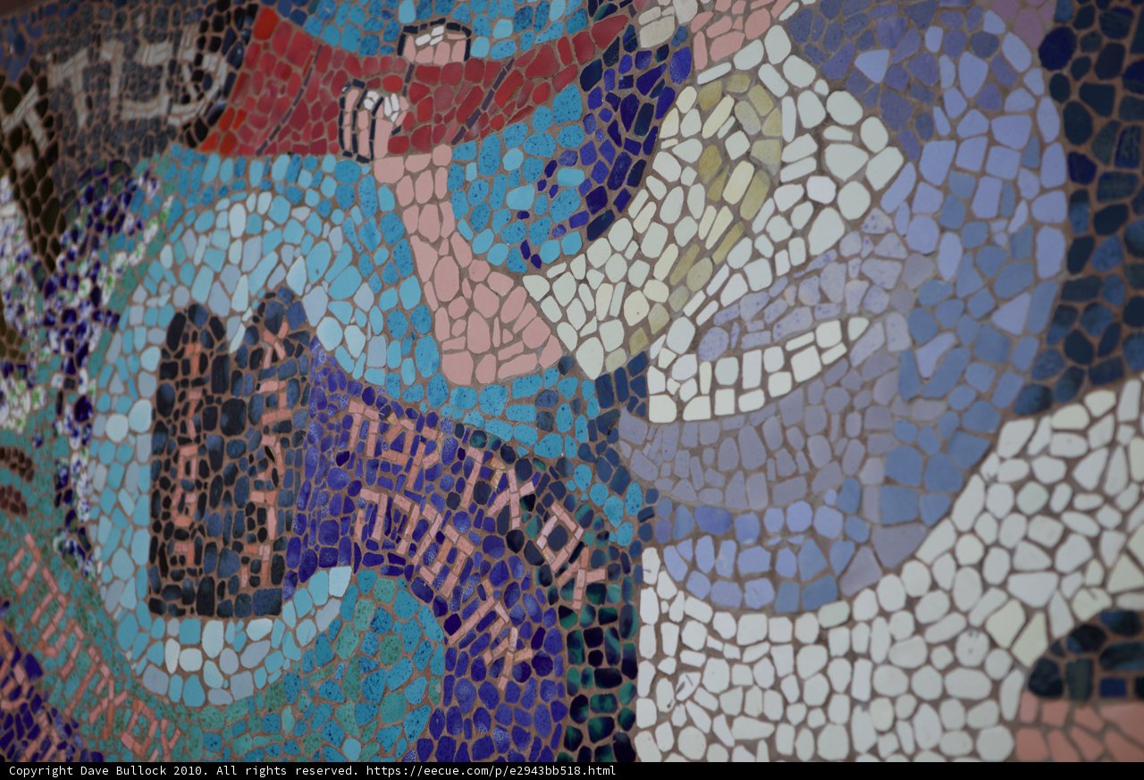 Tile Mosaic Wall with Man and Baby