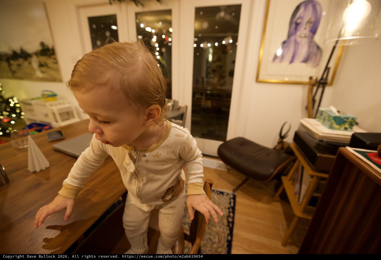 Toddler Exploring Cozy Living Room at Night
