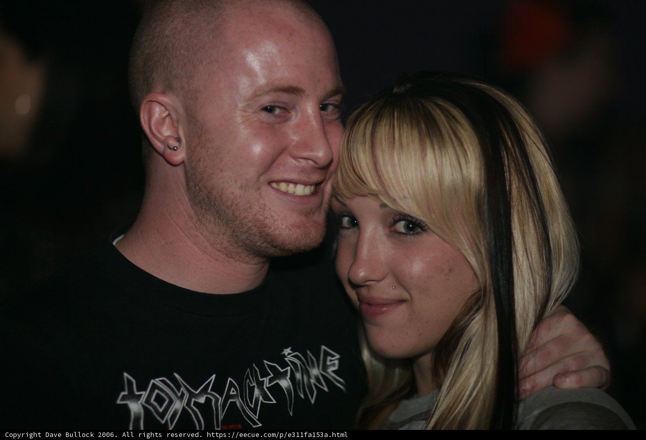 Urban Couple Poses for Night Life Portrait