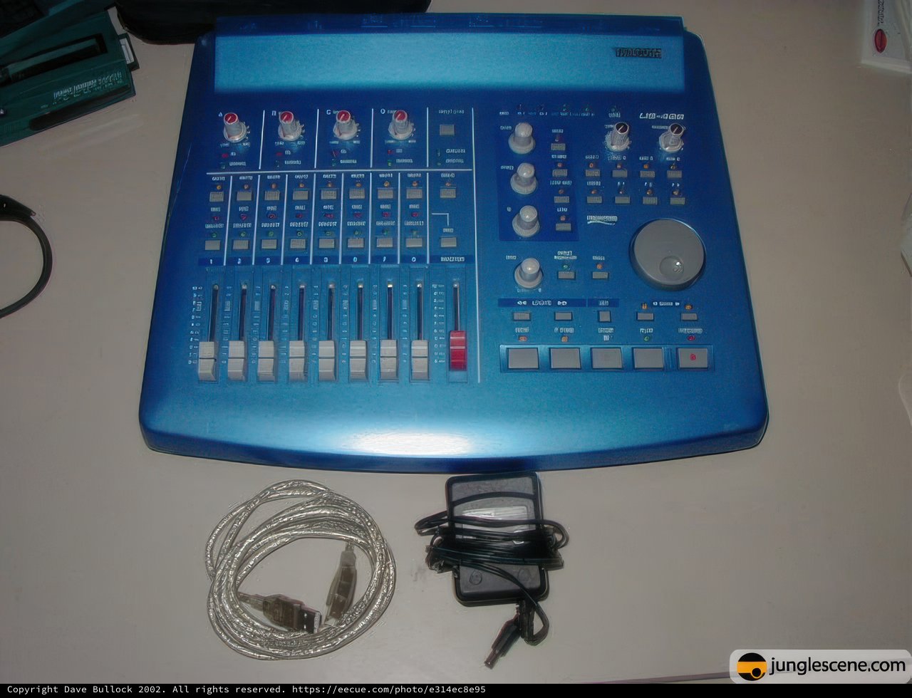 Blue Mixer with Electronic Equipment