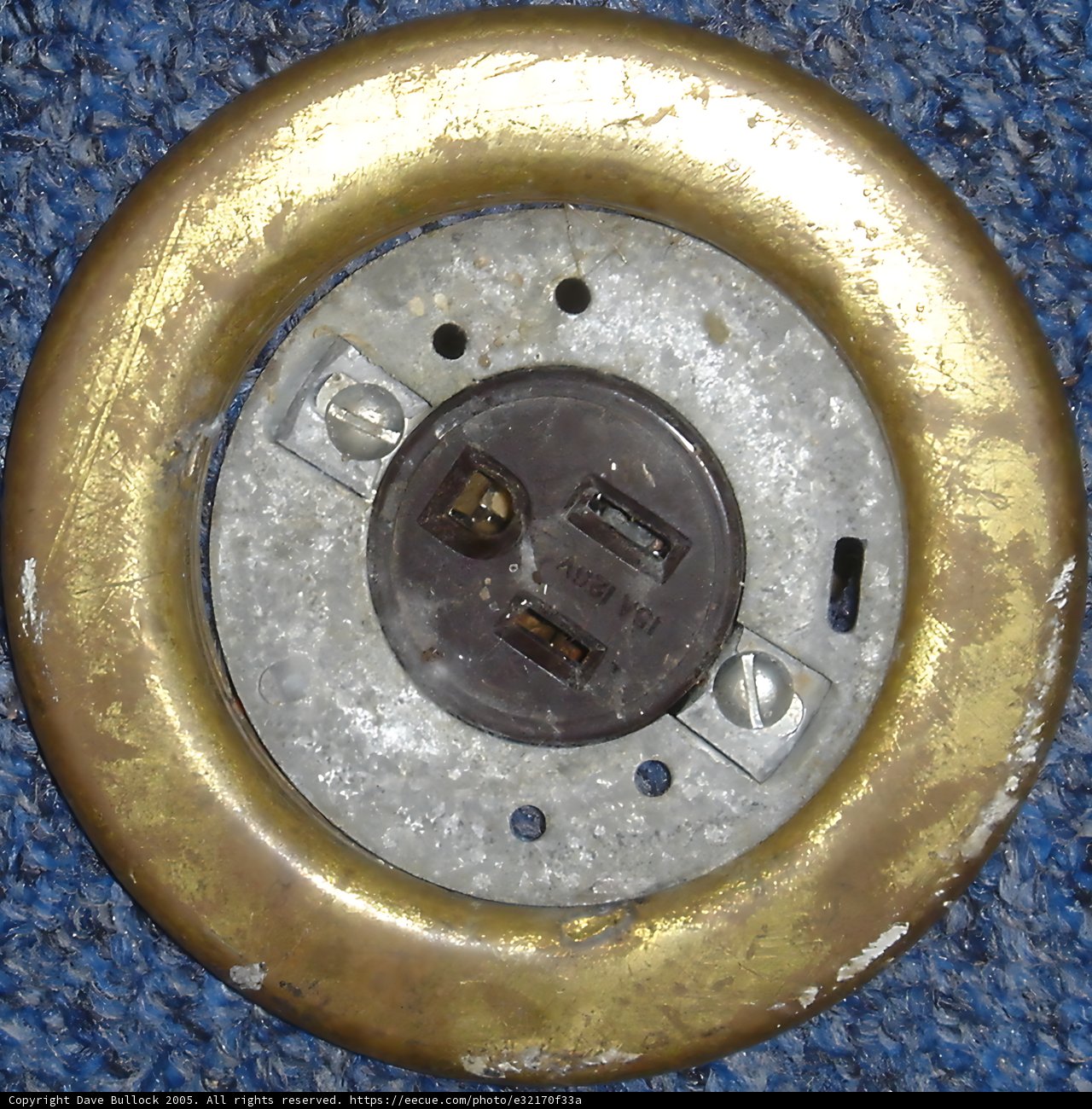The Intricate Brass Light Switch