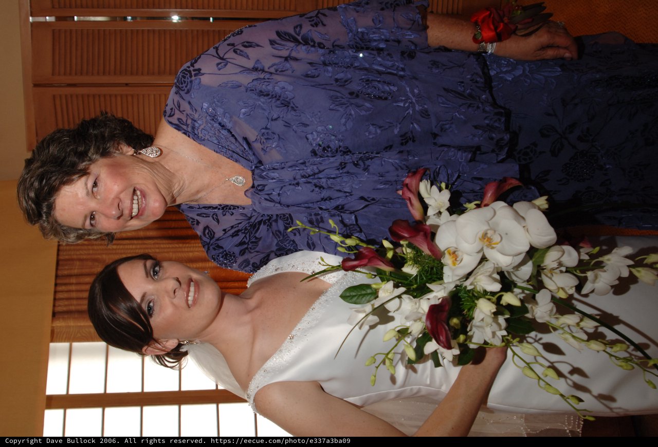Bride and Mother Share Joyful Wedding Day Moment