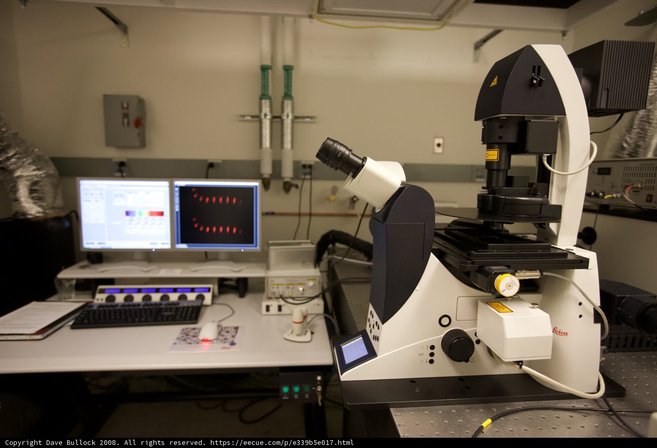 Microscope and Computer on Desk