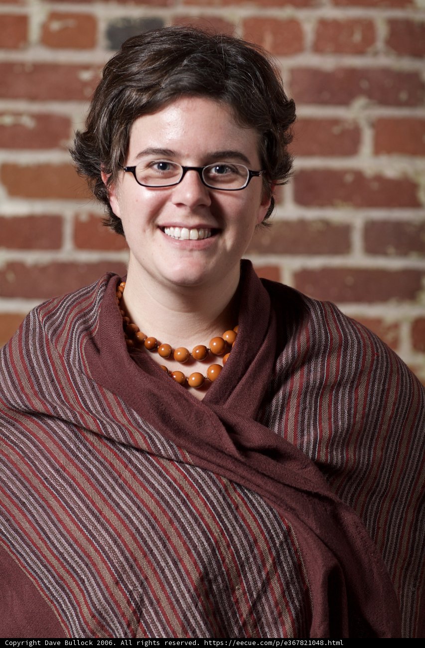 Smiling Beauty in Glasses and Scarf