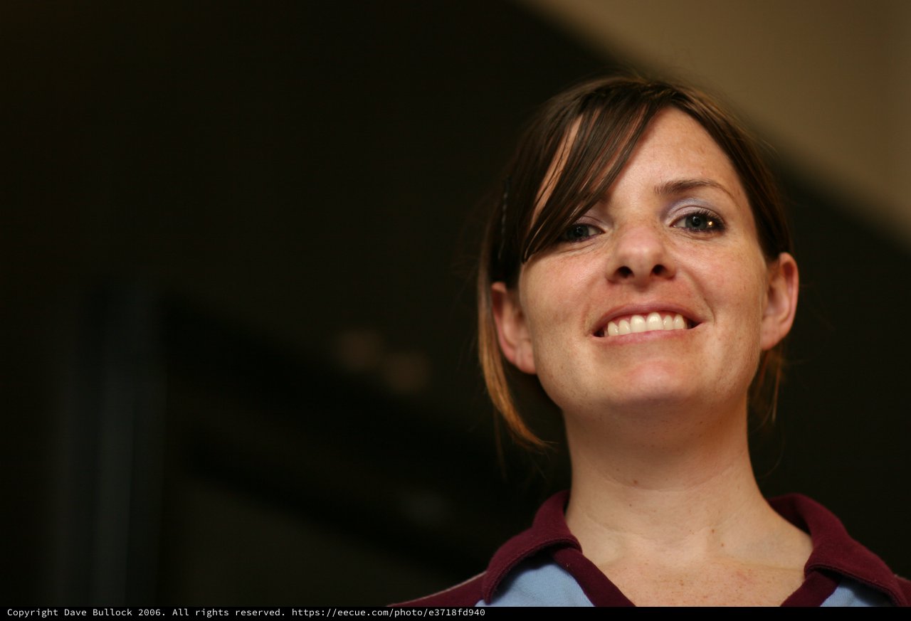 Candid Portrait of a Smiling Woman Looking Up