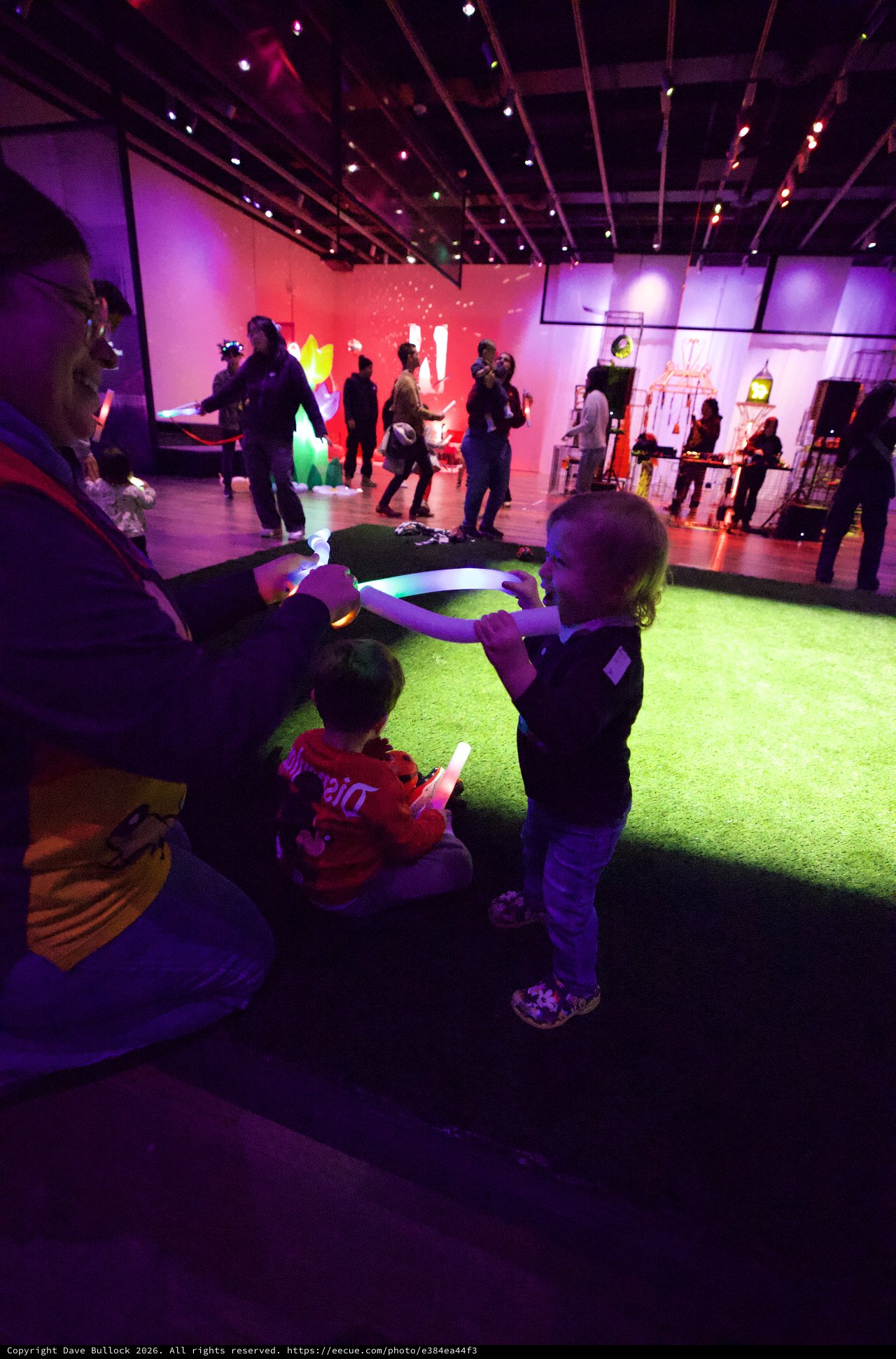 Children Enjoying Interactive Light Installation at Baby Rave