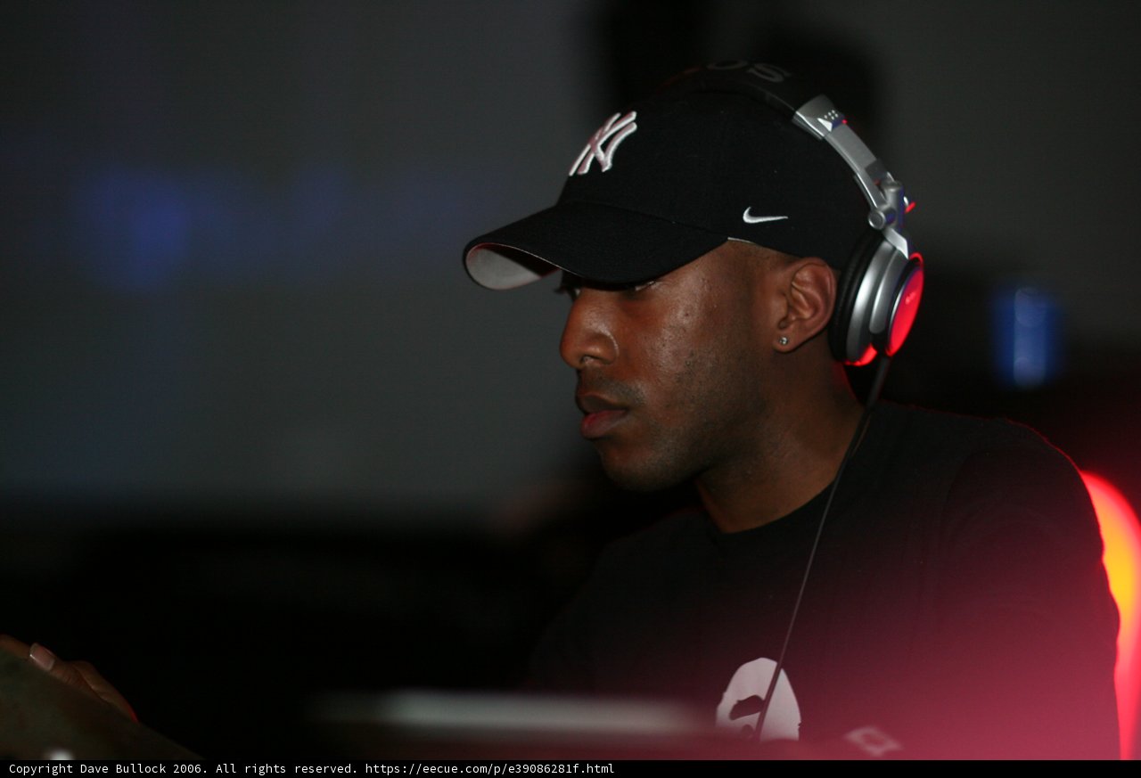 Black-Shirted Deejay with Headphones