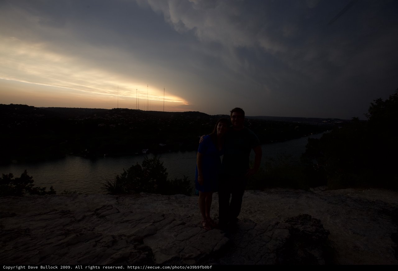 Couple Silhouetted Against Austin Sunset Overlook