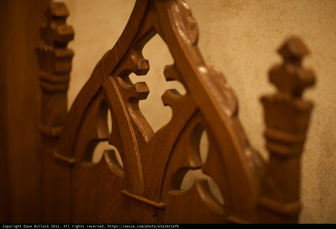 Intricate Carvings on a Wooden Chair