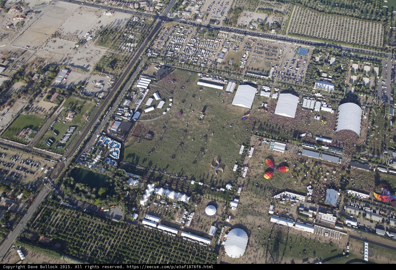 Aerial View of Large Building and Field
