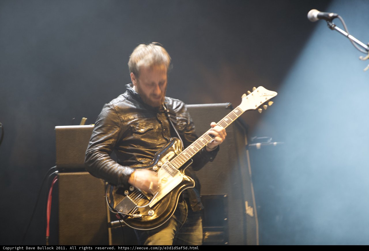 Rocking the Stage with His Electric Guitar