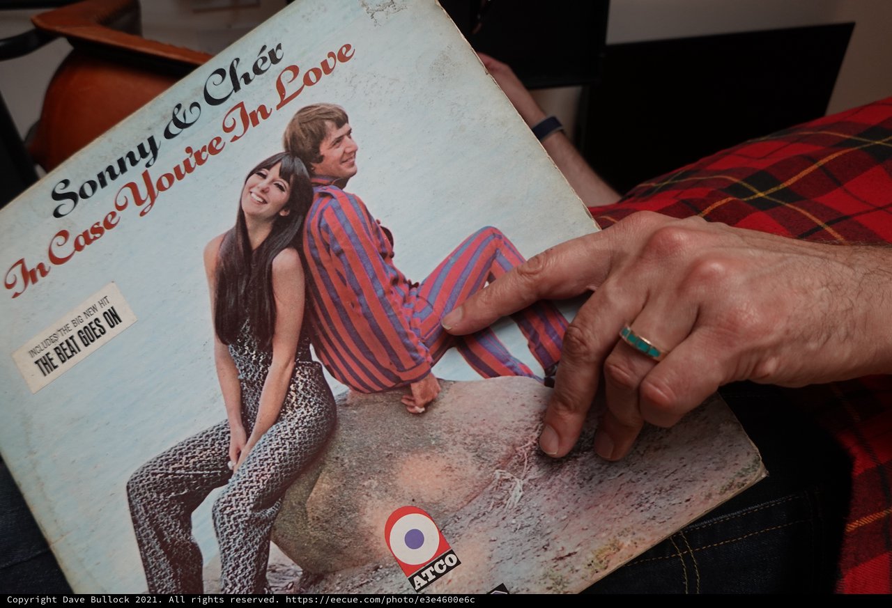 Vintage Record Album Being Displayed by Hand