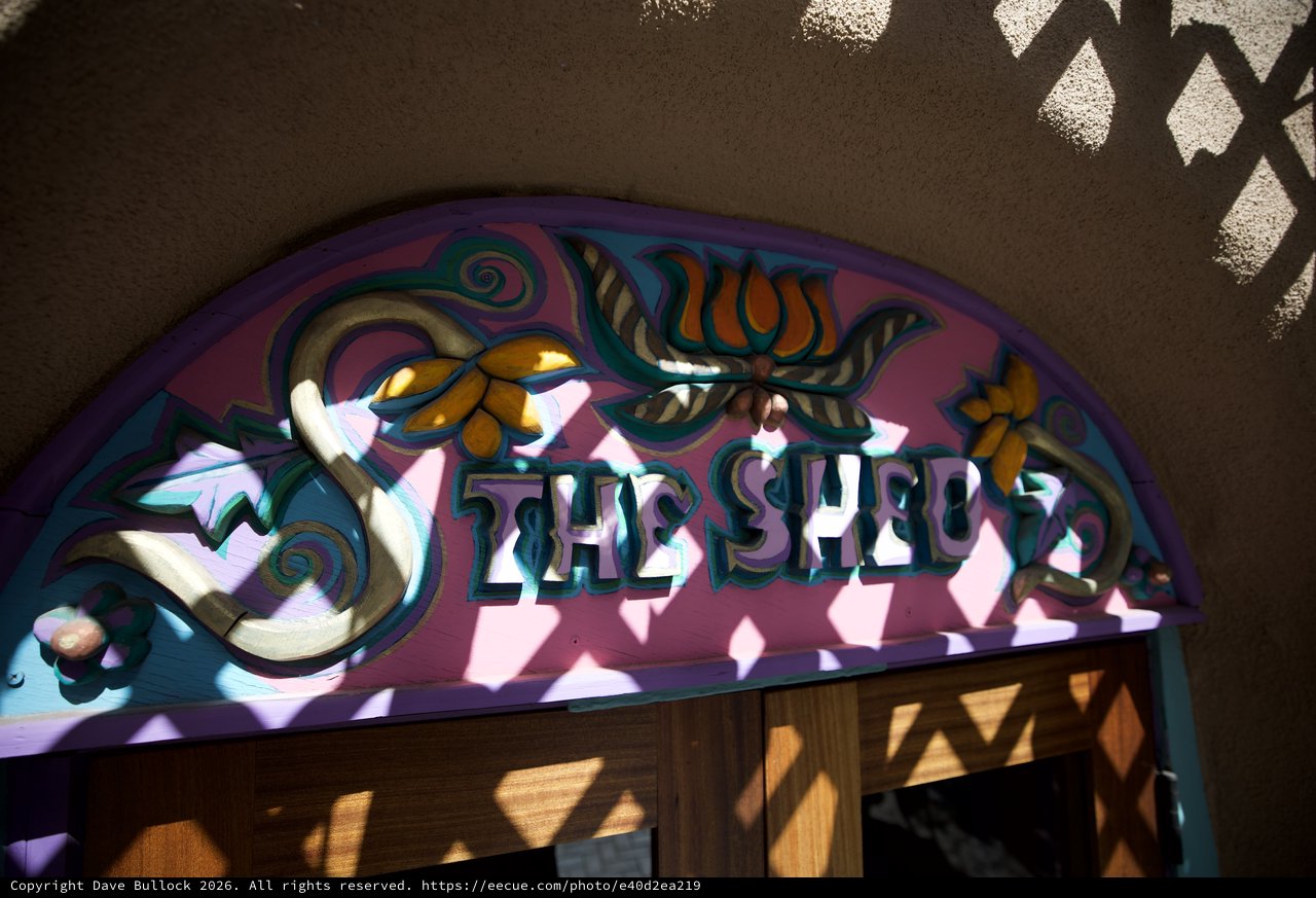 Decorative Shop Sign with Floral Art Nouveau Design