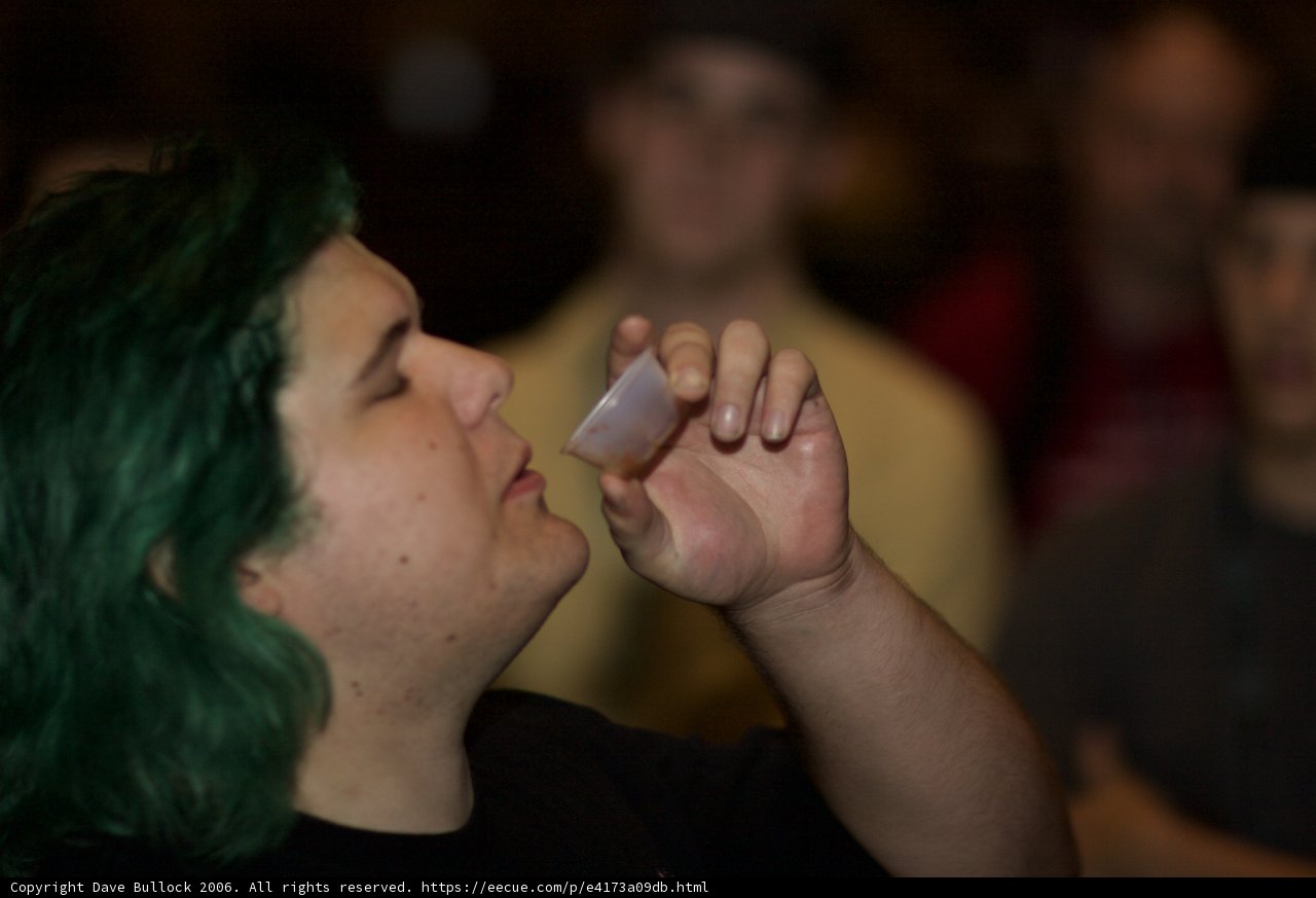 Green-Haired Man Quenches His Thirst