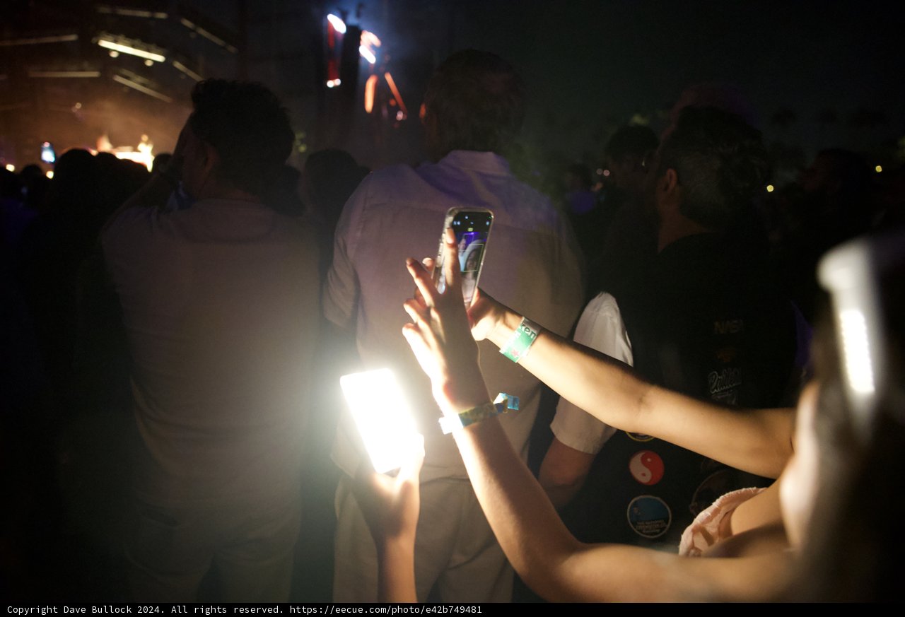 Illuminated Moments: Coachella 2024 Night Scene