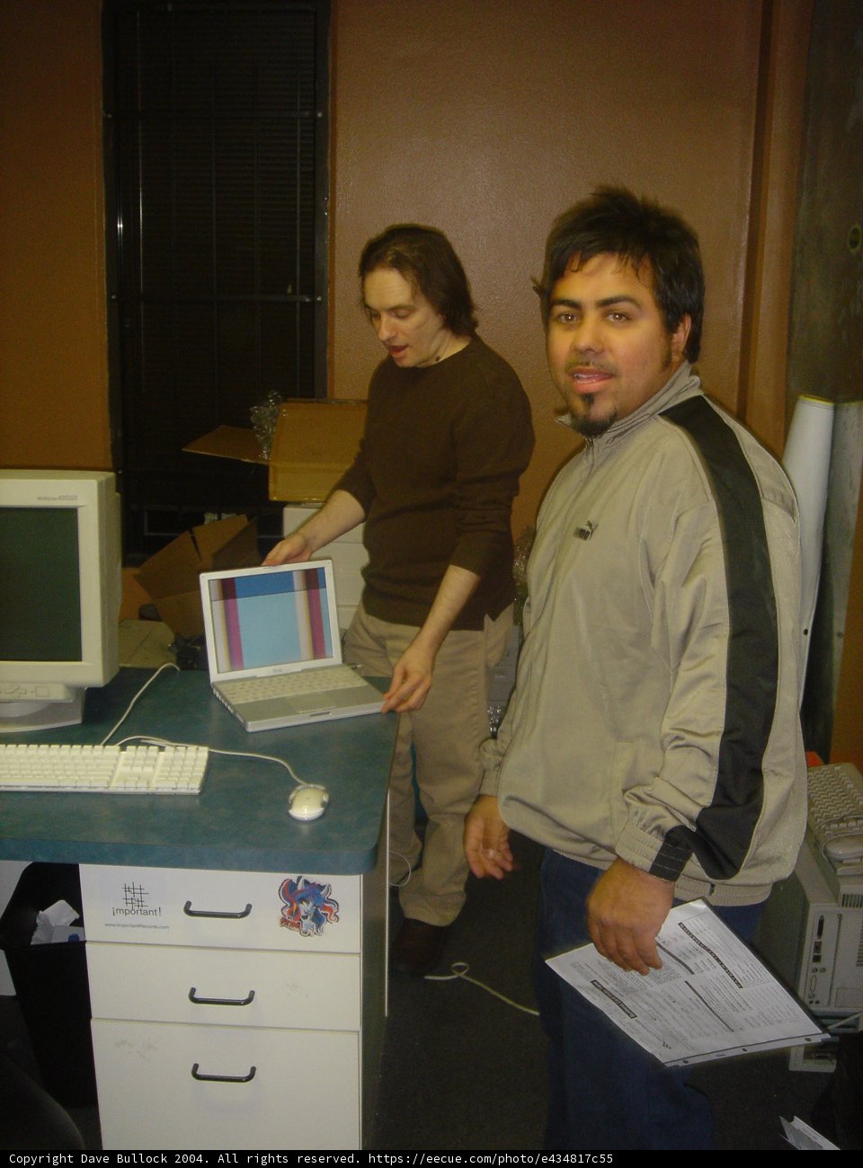 Grey Sweater and Computer Hardware