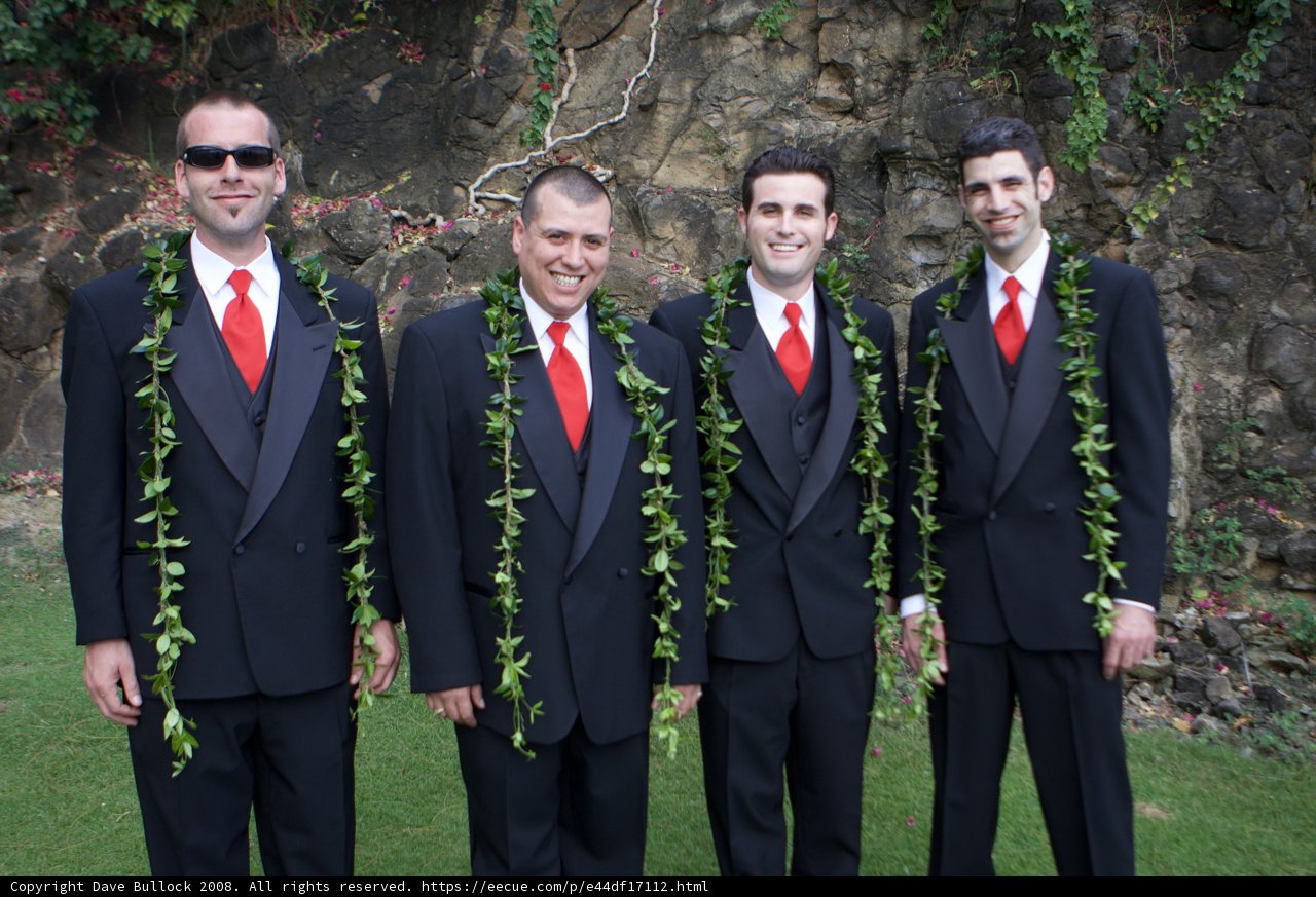 Four Men in Formal Suits and Ties