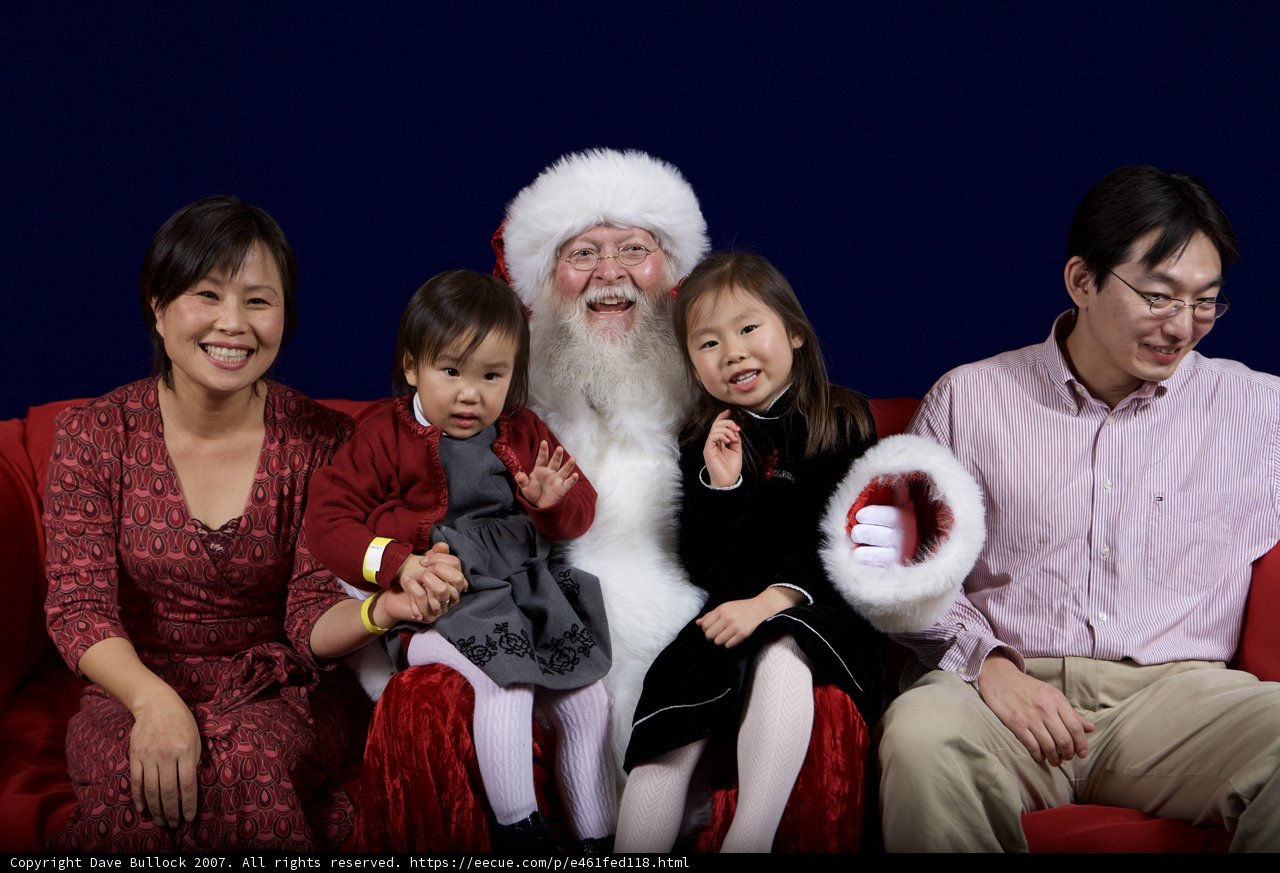 A Festive Family Portrait with Santa