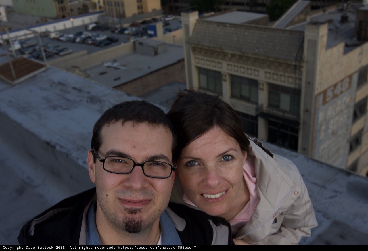 Rooftop Selfie with Urban Cityscape Below