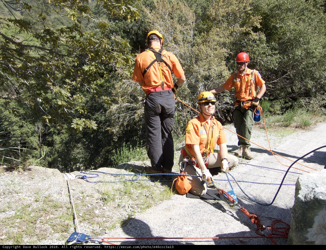 Search and Rescue Team Rappelling Training on Rocky Cliff