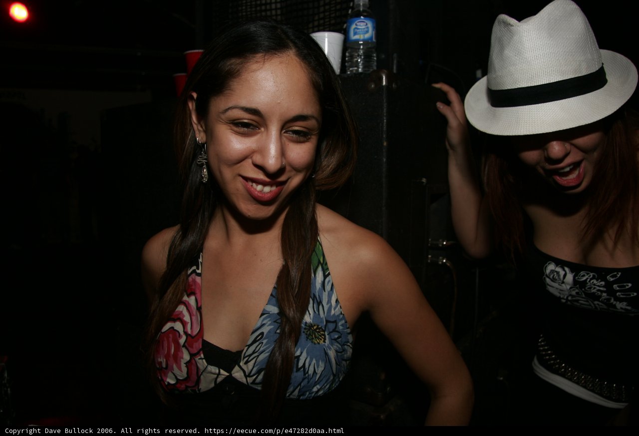 Stylish Woman in Black Top and Fedora
