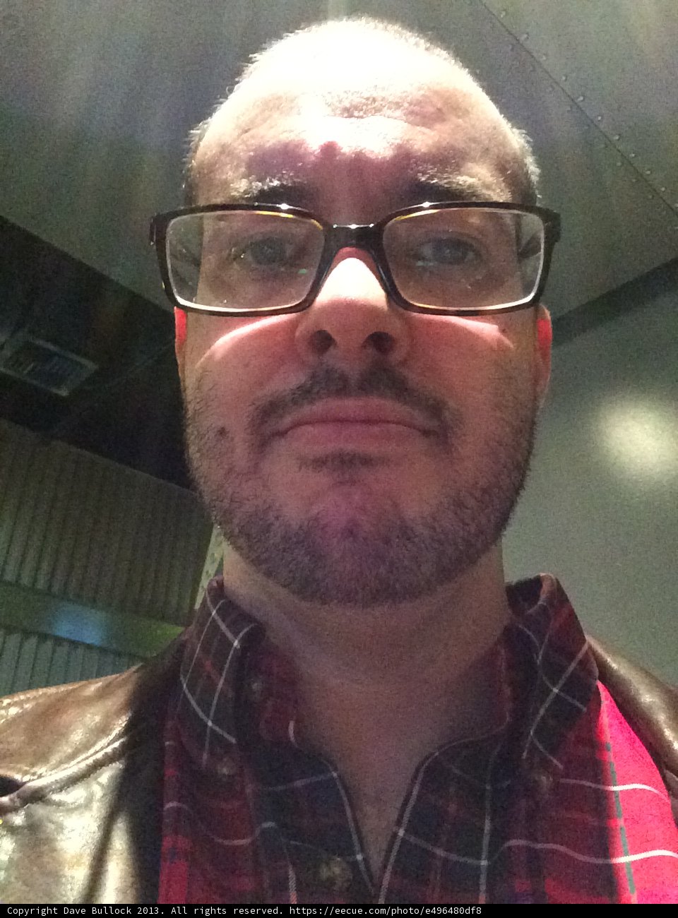 Dave B dons his finest red shirt and specs