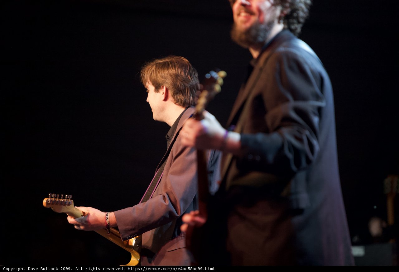 Dual Guitarists Rocking the Stage