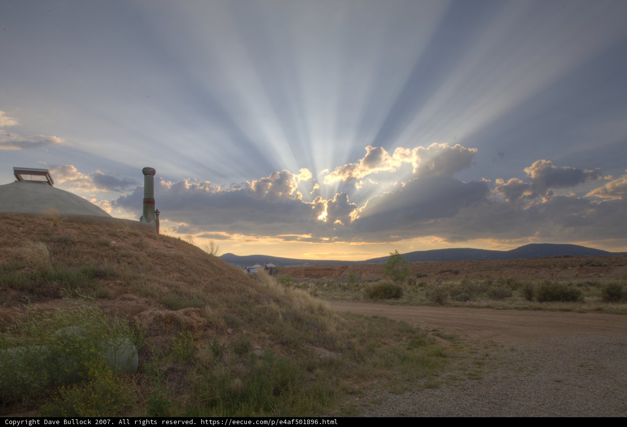 Sunbeams Illuminating Hilltop