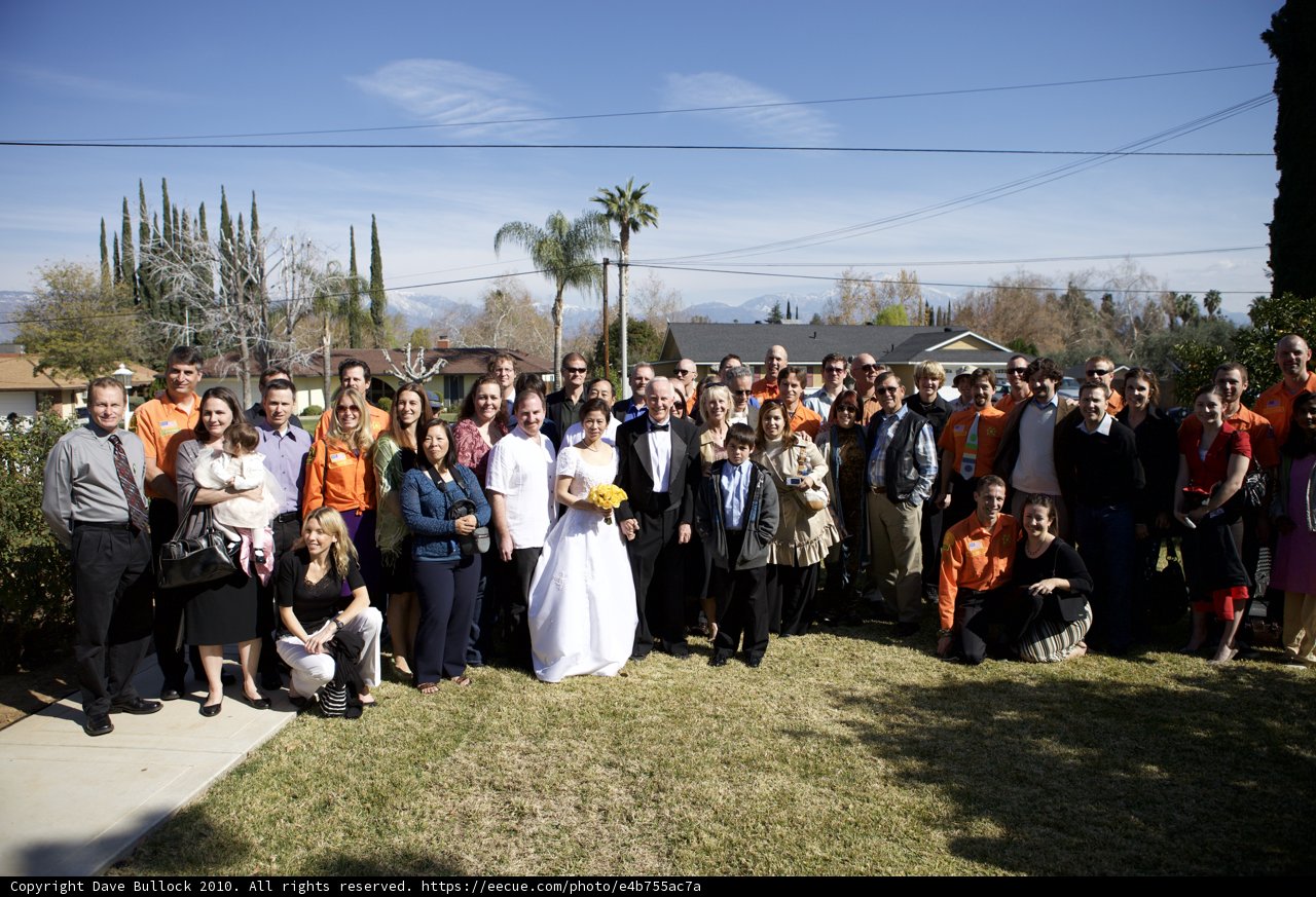 Wedding Bliss in Front of a Gorgeous Home