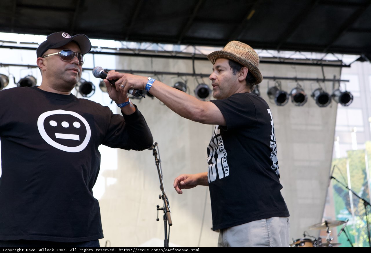 Musical Duo on Stage with Microphones
