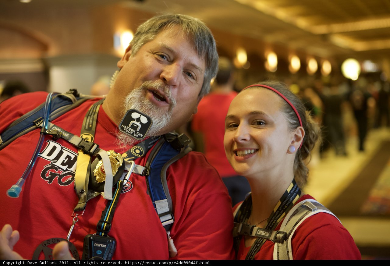 Red Shirted Duo Strikes A Pose