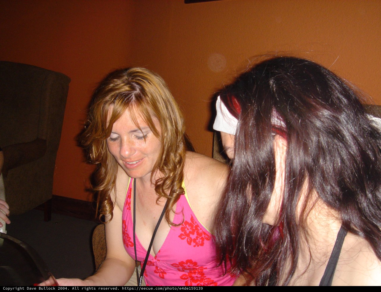 Two Women at a Casual Indoor Social Gathering