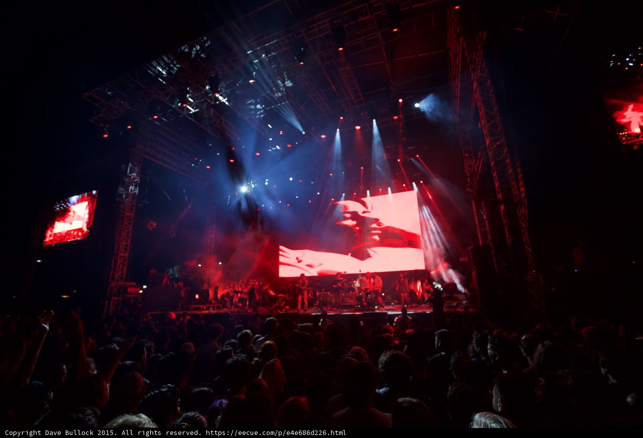 Belle and Sebastian Wide Stage Romantic Video Screen Couple Kissing Red Lighting Spotlight Finale