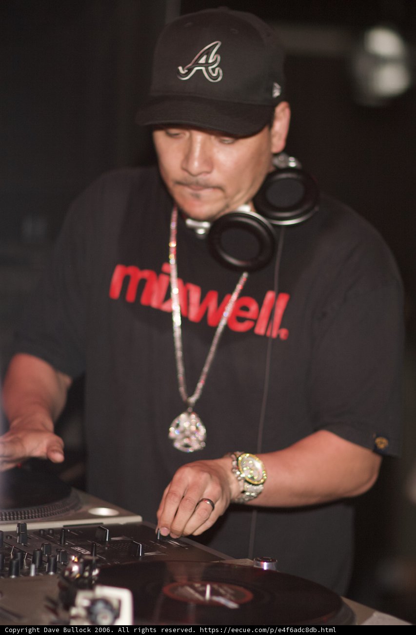 DJ Craze in Black Shirt and Baseball Cap