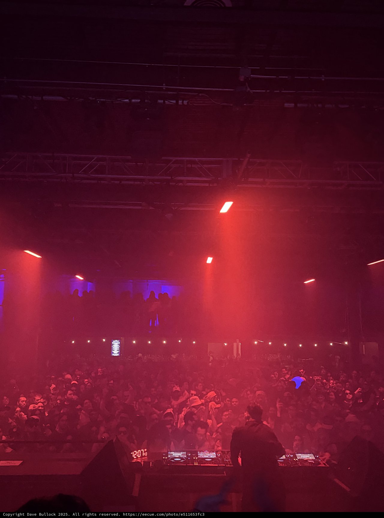 Electronic Music Concert Under Red and Blue Stage Lights