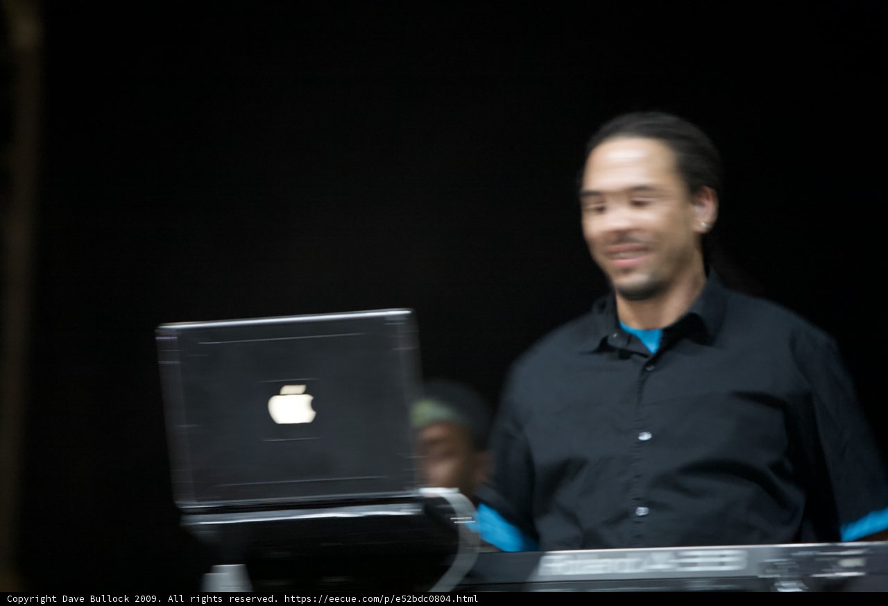 Roni Size Smiling with Laptop