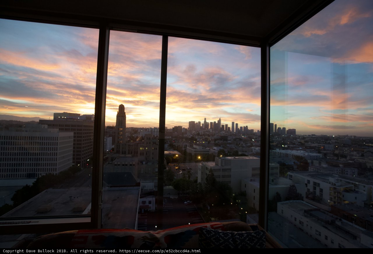 Urban Sunset from a High-Rise Window