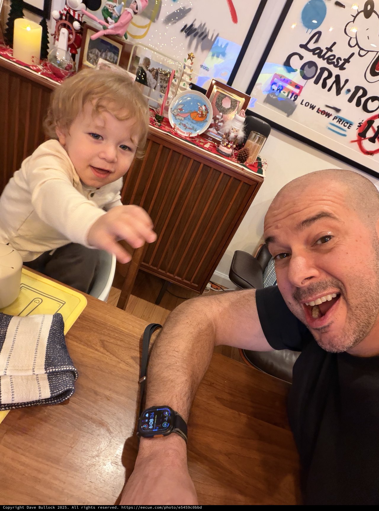 Father and Toddler Selfie at Festive Kitchen Table