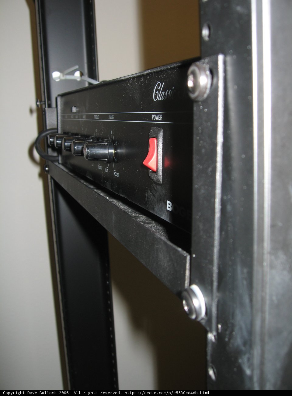 Red Button on Metal Rack
