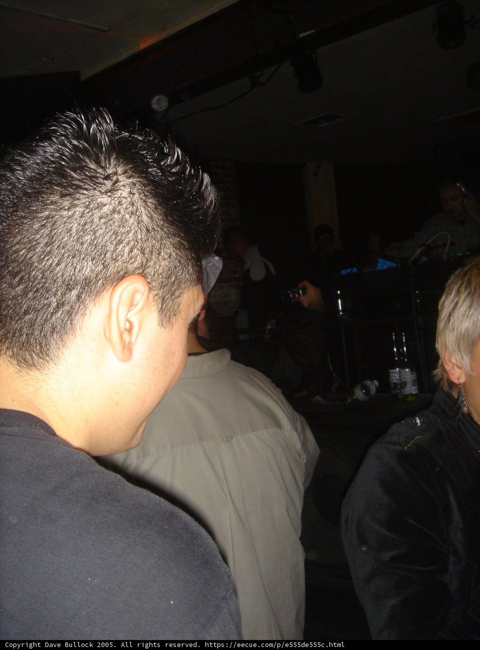 Man Enjoying Nightlife at Urban Pub