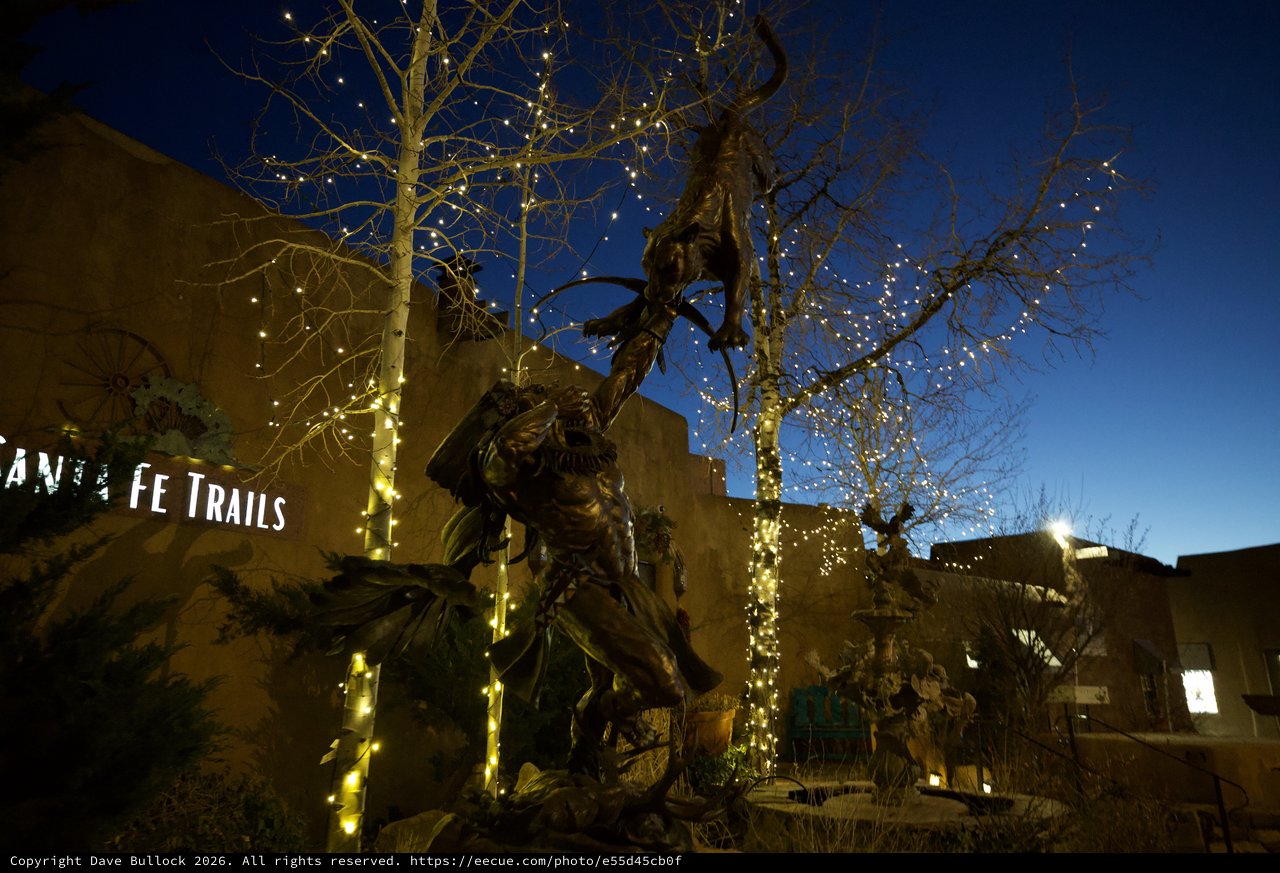 Illuminated Bronze Statue at Twilight in Santa Fe
