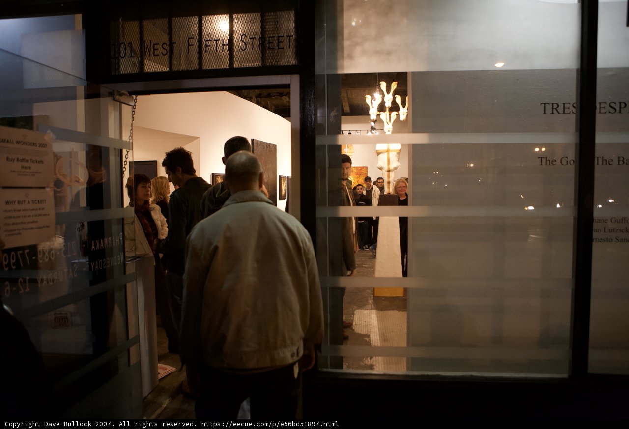Nighttime Gathering Outside of Building