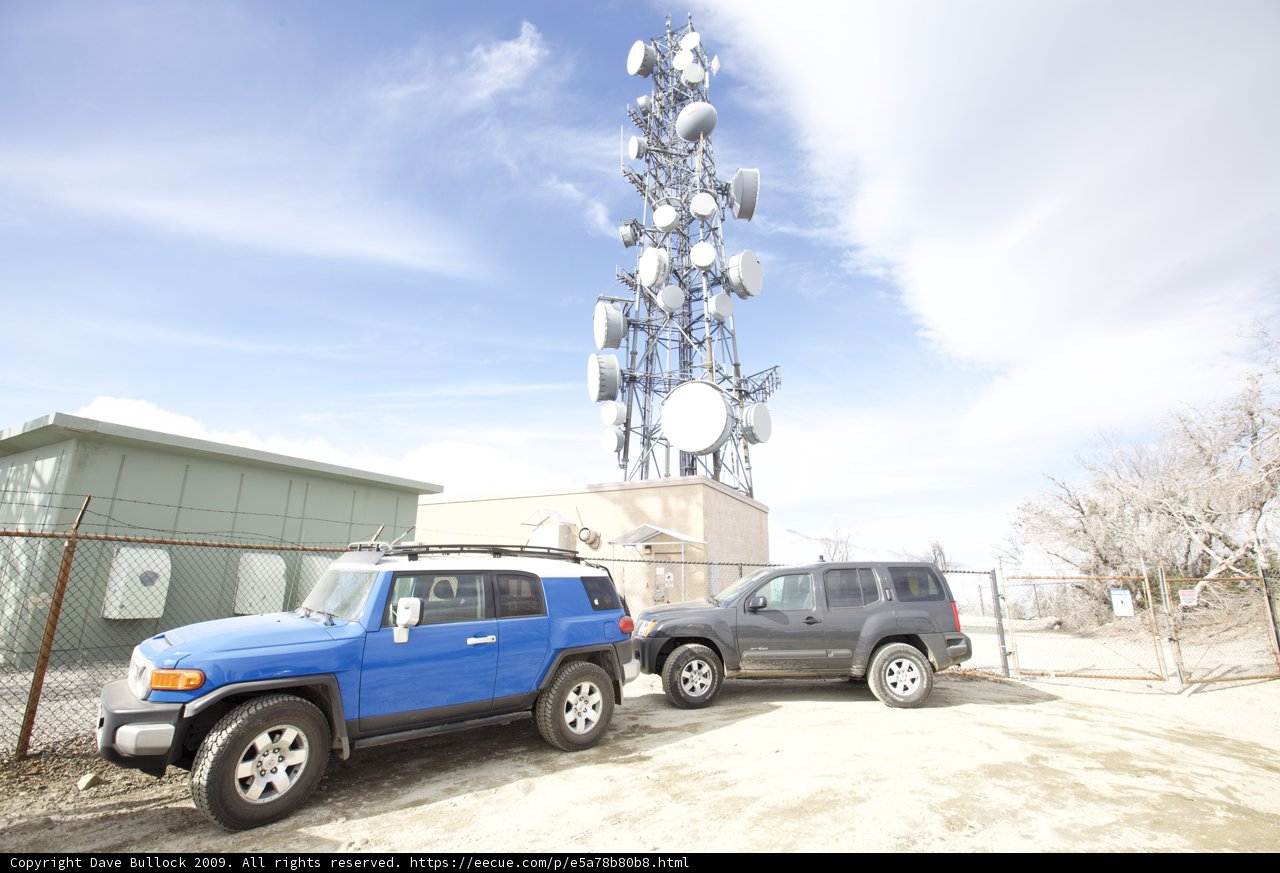 SUVs Parked by the Cell Tower