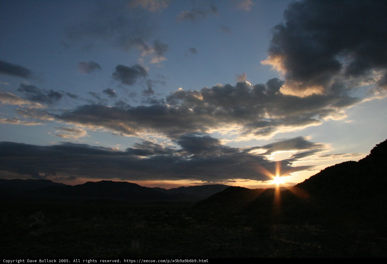 Mountain Sunset through Clouds