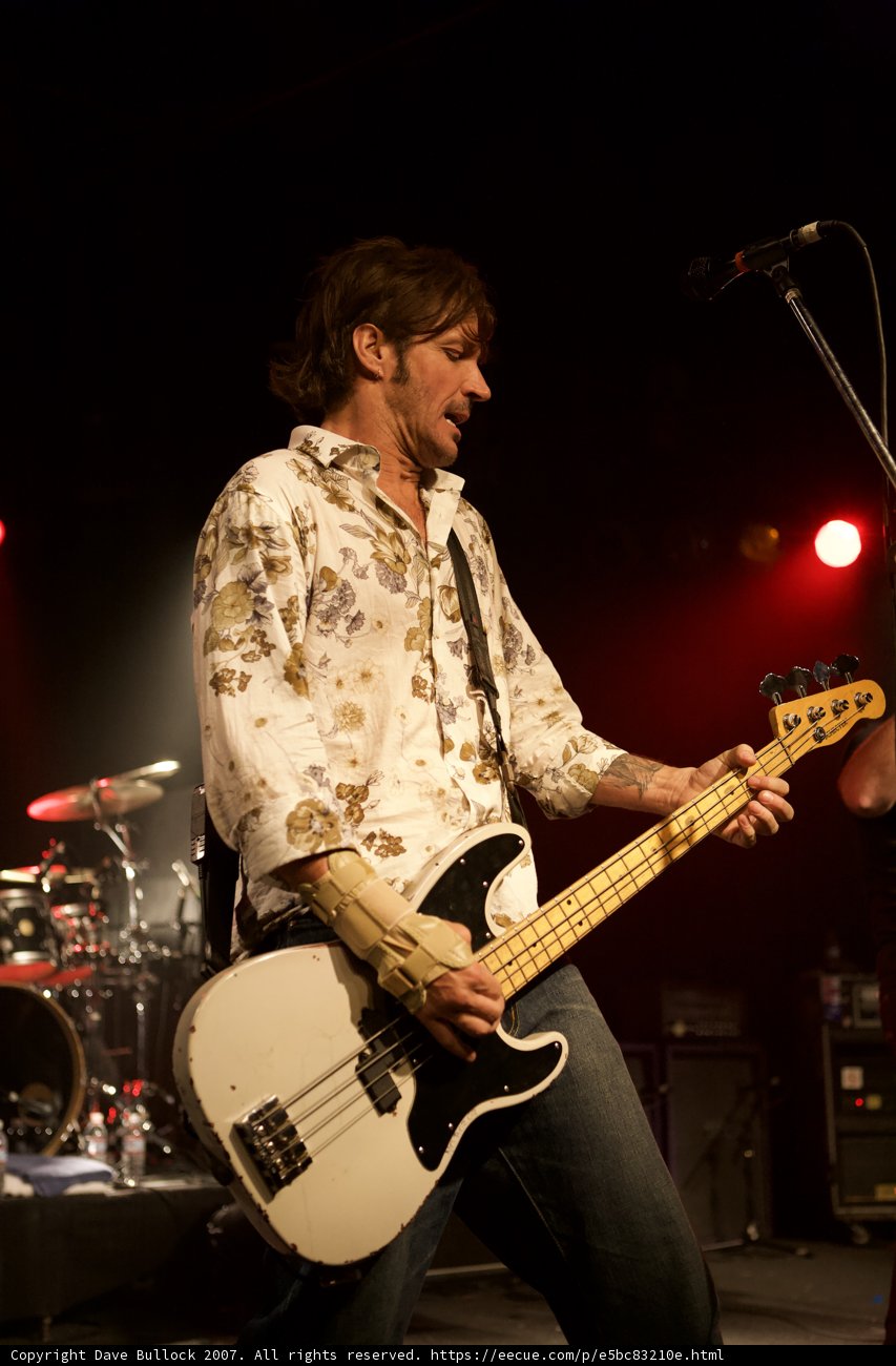 Man Rocking Out on Bass Guitar