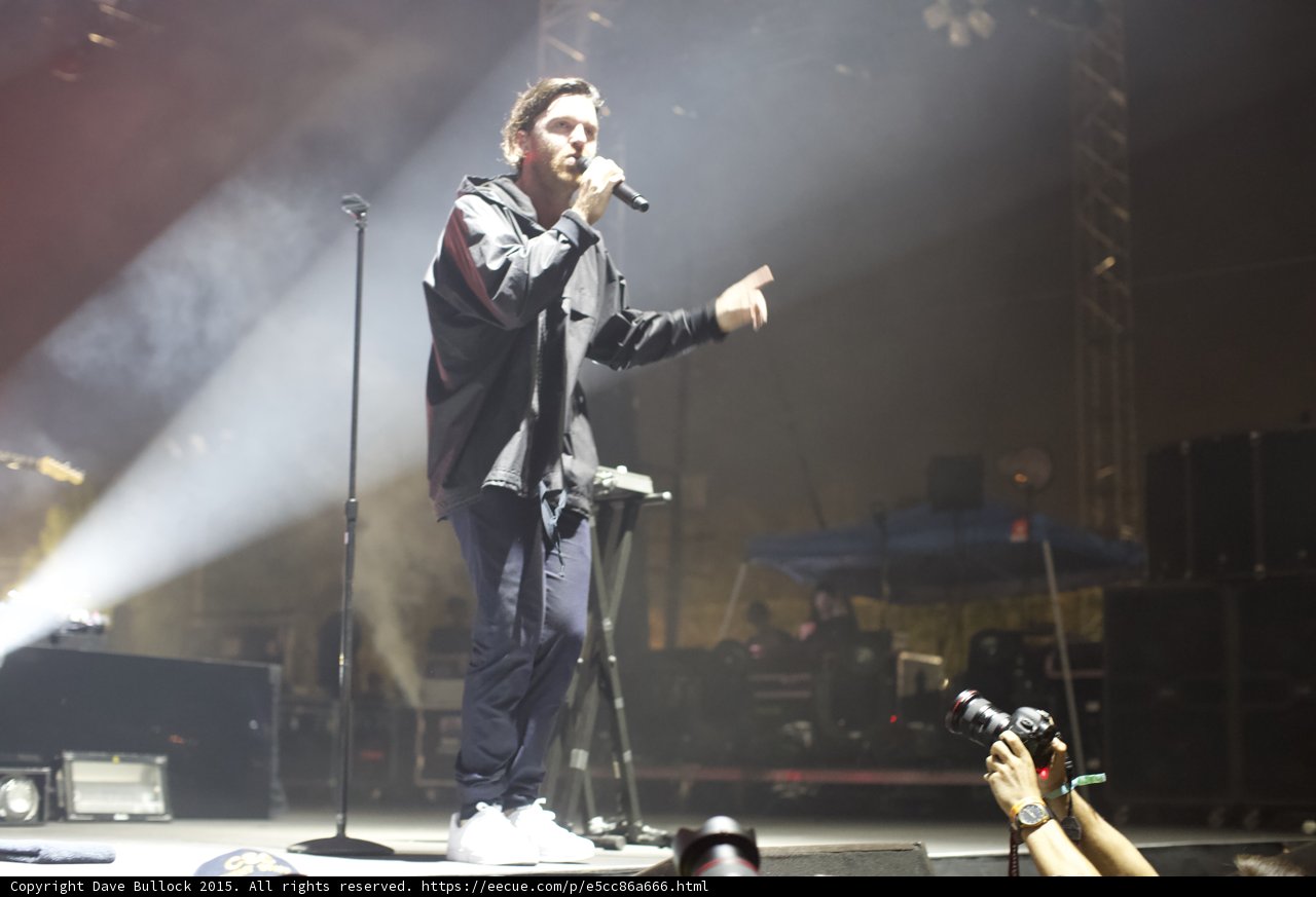Singer Gesturing White Light